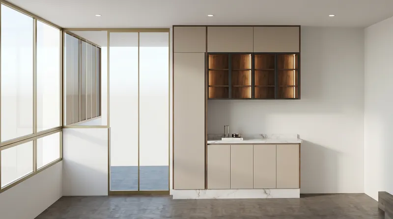 Coin café beige avec vitrine éclairée près d'une baie vitrée